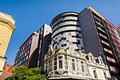 Mixture of old and new architecture on Long Street running through the Central Business District of Cape Town featuring interesting shops, bars and restaurants; Cape Town, Western Cape, South Africa