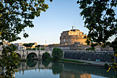 View of the Castel Sant'Angelo (Mausoleum of Hadrian) and Ponte Sant'Angelo from across the River Tiber; Rome, Lazio, Italy