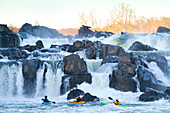 Kayakers running Great Falls of the Potomac River.; Great Falls, Maryland/Virginia.