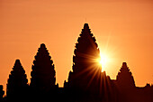 Temple pinnacles at sunrise at Angkor Wat; Siem Reap, Siem Reap Province, Cambodia