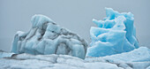Close-up of beautiful icebergs and amazing, blue ice-formations and shapes of the Jökulsárlón Glacier Lagoon located at the south end of the famous Icelandic glacier Vatnajökull in Southern Iceland; South Iceland, Iceland
