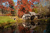 Mabry Mill and pond in autumn.; Mabry Mill, Meadows of Dan, Virginia.