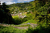 Truck ascends a hillside road above Charlotteville, Tobago; Charlotteville, Tobago, Republic of Trinidad and Tobago