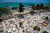 Sandy cemetery near the beach in Belize; Ambergris Caye, Belize