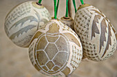 Turtle carved on a coconut shell in Tobago; Tobago, Republic of Trinidad and Tobago