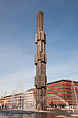 A Column In A Water Fountain Against A Blue Sky; Stockholm Sweden
