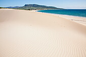 Sand Dunes On White Sand And The Ocean; Bolonia Andalusia Spain