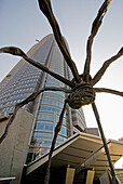 French Sculpture 'maman' At Roppongi Hills With The Tower Seen Behind; Tokyo, Japan