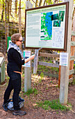 Navigating The Map In Elk Island National Park; Alberta, Canada