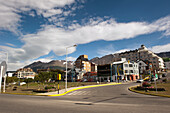 Buildings In The City With Mountains In The Background; Ushuaia, Tierra Del Fuego, Argentina