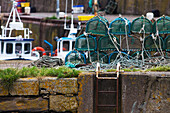Crab Traps Piled On The Shore At The Harbour; Burnmouth Scottish Borders Scotland