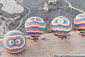 Aerial View Of Hot Air Balloons On The Ground Ready For Flight; Goreme Nevsehir Turkey