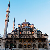 Mosque Of The Valide Sultan Against A Blue Sky; Istanbul Turkey