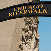 Low Angle View Of A Sign For Chicago Riverwalk; Chicago Illinois United States Of America