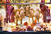 Window display of butcher shop; Bologna, Emilia-Romagna, Italy