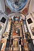 Czech Republic, Ornate wall and ceiling with paintings and sculptures; Prague