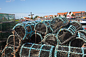 Netherlands, Zealand, Fishing traps along the waterfront at the harbor; Zierikzee