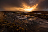 Sunrise Over A Flowing Stream; Snaefellsnes Peninsula, Iceland