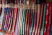 Colourful Scarves Hanging On Display; China