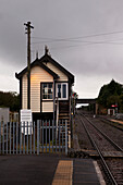 A Building Right Along The Railroad Tracks; England