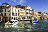 Buildings And Boats Along The Grand Canal; Venice, Italy