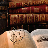 Pair of Glasses Resting on Book