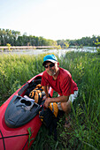 Portrait of Senior Man with Kayak, Saskatchewan, Canada