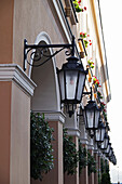 Close-up of a row of lanterns on buildings, Old Town, Warsaw, Poland.