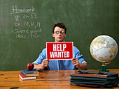 Teacher with Help Wanted Sign