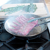 Cooking Meat in Frying Pan