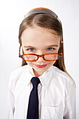Girl Looking over Glasses