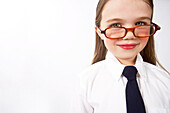 Girl Looking over Glasses