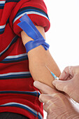 Close-up of Boy Getting a Needle