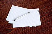 Pen and Papers on Desk