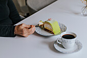 View of person eating cake