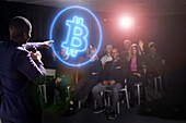 Bitcoin crypto currency expert giving speech to audience