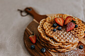 High angle view of waffles with fruits