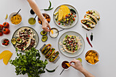 People sharing various healthy Mexican food