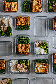 Overhead view of lunch boxes as part of healthy meal prep