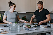 Couple doing healthy meal prep at home