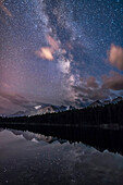 The summer Milky Way in portrait orientation over Herbert Lake and Mount Temple and peaks around Lake Louise, in Banff National Park, Alberta. Taken August 29, 2016.