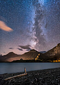 The Milky Way over the distant Prince of Wales Hotel from Driftwood Beach, in Waterton Lakes National Park, September 24, 2016. Being at the end of the season, the hotel is closed and dark. The bright star at centre is Altair in Aquila.
