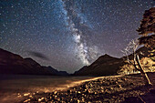 The Milky Way over Upper Waterton Lake, Waterton Lakes National Park, Alberta, on August 29, 2013. This is a US World Heritage Site. Taken with the 14mm lens and Canon 5D MkII for 60 seconds at ISO 3200 and f/2.8. Light from town streetlights provides the illumination. The Moon was not up. It was a very windy night!