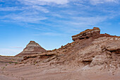 Eroded formations in the colorful bentonite clay hills of the Morrison Formation in the Caineville Desert near Hanksville, Utah.