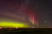 A Kp4-level aurora to the north with a STEVE arc to the east with traits of a red SAR arc as well. Taken from home as part of a time-lapse sequence, August 29, 2022, with the Canon R6 and Venus Optics Laowa 15mm lens at f/2 for 20 seconds at ISO 1600.
