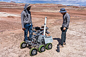 Team members work on the Binghamton University Mars Rover in the University Rover Challenge, Mars Desert Research Station, Utah. SUNY Binghamton, Binghamton University Rover Team.