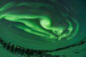 One of a short series of images showing the development of an aurora display from a classic arc into a more complex pattern of concentric arcs and with loops and swirls. This was Feb 5, 2019 from the Churchill Northern Studies Centre. The outburst lasted only 5 minutes or so and might have been due to the Bz interplanetary field turning south briefly. After this series, the display faded and fractured into faint arcs and a diffuse glow across the sky.