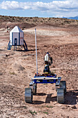 The OzU Mars Rover approaches the Mars Lander in the University Rover Challenge. Mars Desert Research Station, Utah. Ozyegin University, Istanbul, Turkey