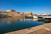 View of Archaeological Museum of Olbia and harbour boats on sunny day on Olbia, Olbia, Sardinia, Italy, Mediterranean, Europe