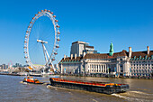 London Eye, tug boat and barge, River Thames, London, England, United Kingdom, Europe